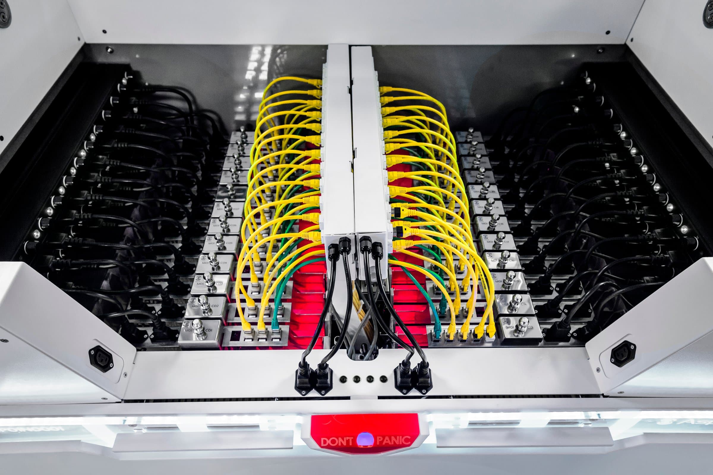 Servers submerged in an immersion cooling tank